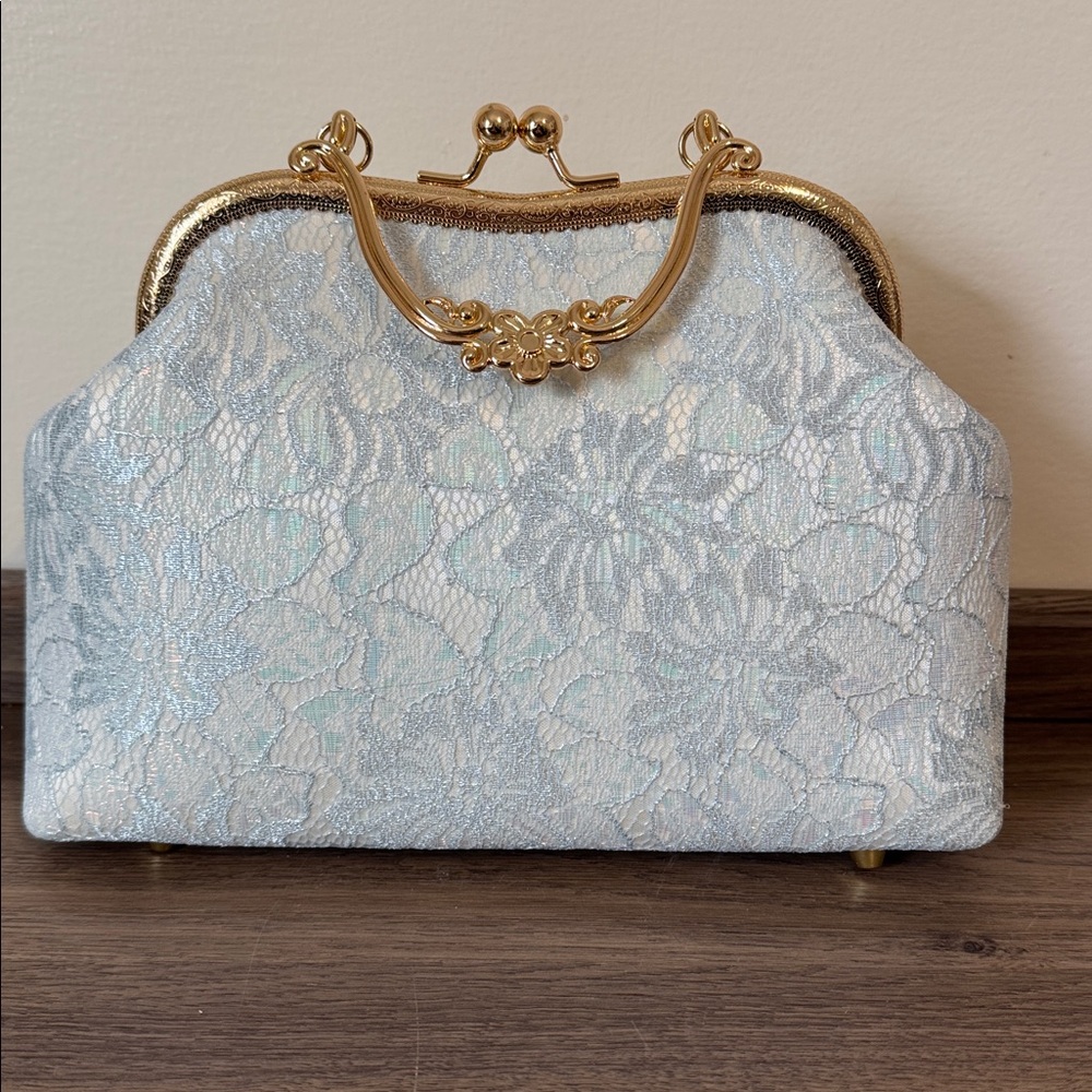Disney China Pavilion Handbag.  Light Blue with Reflective Metallic Thread